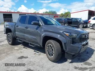 2025 Toyota Tacoma SR5 with VIN 3TMKB5FNXSM033896, listed as a IAAI auction lot 42973626 with 2,401 mi miles and . Bid and sale history available at DreamBid. Image 1.
