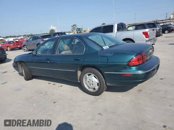 1998 Chevrolet Lumina with VIN 2G1WL52M7W9310815, listed as a Copart auction lot 59181775 with 93,661 mi miles and Salvage title. Bid and sale history available at DreamBid. Image 2.