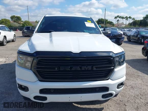 2021 Ram 1500 Lone Star z VIN 1C6RREFT1MN749997, wystawiony jako IAAI lot #41306635 z przebiegiem 59 451 mil mil oraz . Historia ofert i sprzedaży dostępna na DreamBid. Obrazek 12.