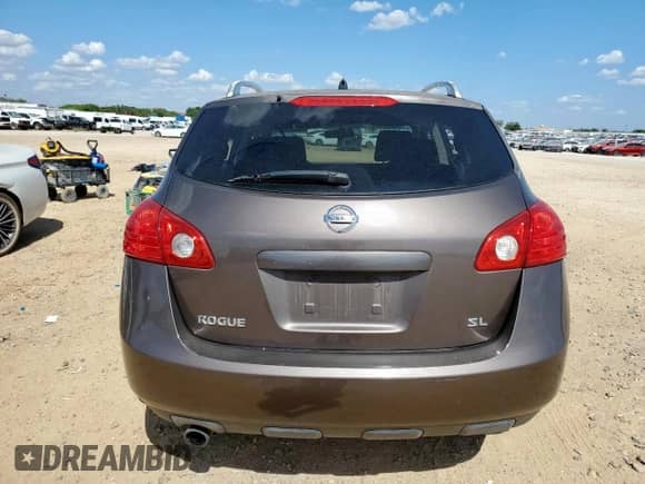 2009 Nissan Rogue S with VIN JN8AS58T39W060251, listed as a Copart auction lot 70827725 with 173,828 mi miles and Salvage title. Bid and sale history available at DreamBid. Image 6.