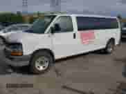 2013 Chevrolet Express Passenger LT z VIN 1GAZG1FG7D1121873, wystawiony jako Copart lot #64763815 z przebiegiem Nie podano mil oraz Czysty tytuł • Clean title. Historia ofert i sprzedaży dostępna na DreamBid. Obrazek 1.