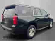 2015 Chevrolet Tahoe LT with VIN 1GNSKBKC4FR56770, listed as a Copart auction lot 64114815 with 203,448 mi miles and Clean title. Bid and sale history available at DreamBid. Image 4.