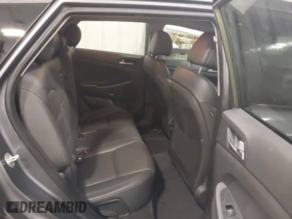 2018 Hyundai Tucson Value z VIN KM8J33A28JU615981, wystawiony jako IAAI lot #42281881 z przebiegiem 71 835 mil mil oraz . Historia ofert i sprzedaży dostępna na DreamBid. Obrazek 8.