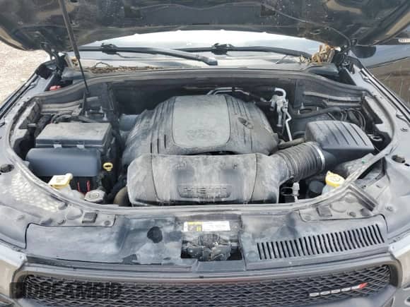 2018 Dodge Durango R/T with VIN 1C4SDJCT8JC327948, listed as a Copart auction lot 65422195 with 104,555 mi miles and Salvage title. Bid and sale history available at DreamBid. Image 12.