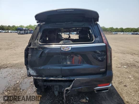 2023 Cadillac Escalade 4WD Premium Luxury with VIN 1GYS4BKL7PR384973, listed as a Copart auction lot 60155425 with Not provided miles and Salvage title. Bid and sale history available at DreamBid. Image 6.