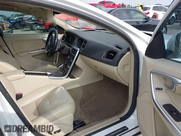 2015 Volvo S60 T5 Drive-E Premier with VIN YV126MFB8F1305105, listed as a IAAI auction lot 42566641 with 115,535 mi miles and . Bid and sale history available at DreamBid. Image 5.