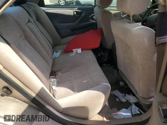 1997 Toyota Camry LE z VIN 4T1BF22K3VU917365, wystawiony jako Copart lot #71729625 z przebiegiem 140 103 mil mil oraz Szkoda całkowita • Salvage title. Historia ofert i sprzedaży dostępna na DreamBid. Obrazek 10.