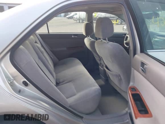 2004 Toyota Camry LE with VIN 4T1BE32K14U896992, listed as a IAAI auction lot 42709172 with 153,248 mi miles and . Bid and sale history available at DreamBid. Image 8.
