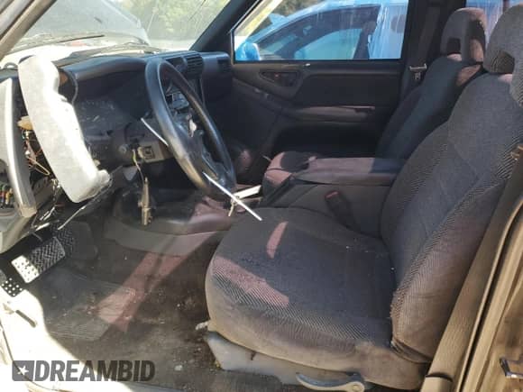 1994 Chevrolet S-10 with VIN 1GCCT14W6R8202686, listed as a Copart auction lot 69905174 with 234,094 mi miles and Salvage title. Bid and sale history available at DreamBid. Image 7.