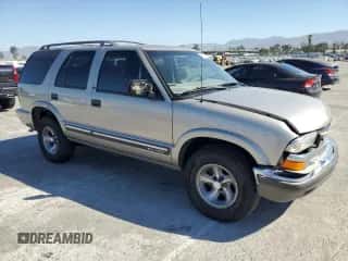 2000 Chevrolet Blazer LS с VIN 1GNCS13W3YK125255, выставлен на аукционе Copart как лот 67570164 с пробегом 188 315 миль миль и Списание • Salvage title. История ставок и продаж доступна на DreamBid. Изображение 4.