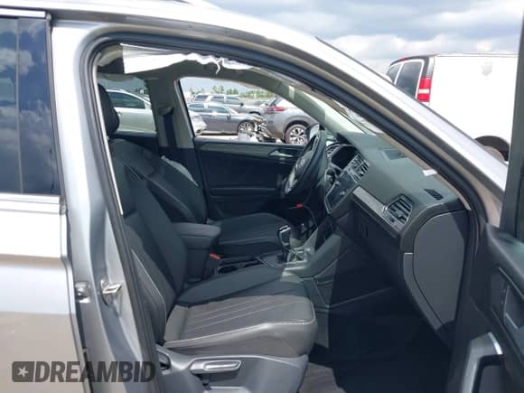 2023 Volkswagen Tiguan SE with VIN 3VVNB7AX3PM023303, listed as a IAAI auction lot 42459020 with 19,844 mi miles and . Bid and sale history available at DreamBid. Image 5.