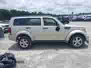 2009 Dodge Nitro SE z VIN 1D8GT28K79W532123, wystawiony jako IAAI lot #42627816 z przebiegiem 227 864 mil mil oraz . Historia ofert i sprzedaży dostępna na DreamBid. Obrazek 13.