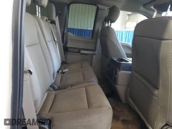 2018 Ford F-150 XL с VIN 1FTFX1E51JKE82628, выставлен на аукционе Copart как лот 90650065 с пробегом 79 462 миль миль и Списание • Salvage title. История ставок и продаж доступна на DreamBid. Изображение 10.