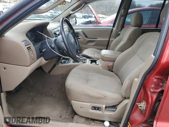 2002 Jeep Grand Cherokee с VIN 1J8GX38S92C176329, выставлен на аукционе Copart как лот 47885635 с пробегом 154 167 миль миль и Списание • Salvage title. История ставок и продаж доступна на DreamBid. Изображение 7.