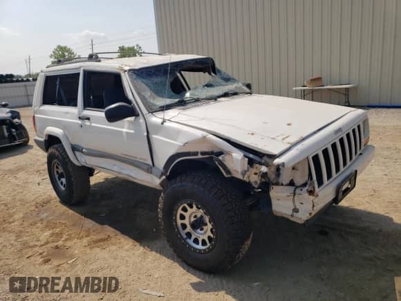 2001 Jeep Grand Cherokee с VIN 1J4FT47S21L596528, выставлен на аукционе Copart как лот 68641764 с пробегом Не указан миль и Списание • Salvage title. История ставок и продаж доступна на DreamBid. Изображение 4.