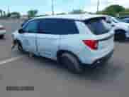 2021 Honda Passport EX-L with VIN 5FNYF7H59MB001083, listed as a IAAI auction lot 42943781 with 56,549 mi miles and . Bid and sale history available at DreamBid. Image 3.