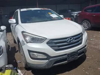 2014 Hyundai Santa Fe with VIN 5XYZUDLAXEG183108, listed as a IAAI auction lot 42384854 with 160,963 mi miles and . Bid and sale history available at DreamBid. Image 1.