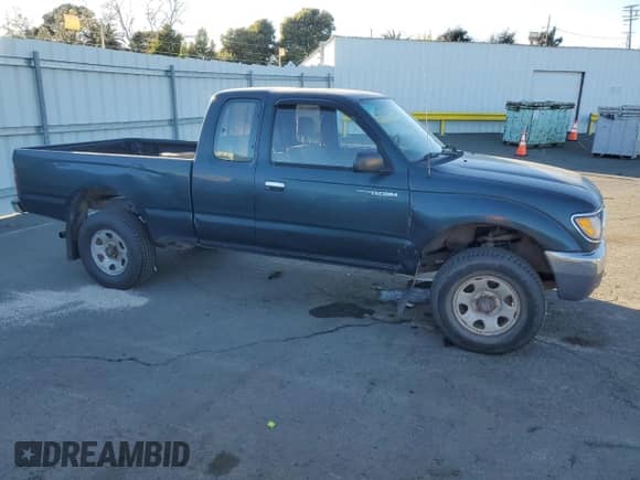 1997 Toyota Tacoma z VIN 4TAWM72N4VZ324227, wystawiony jako Copart lot #50633325 z przebiegiem 296 625 mil mil oraz Czysty tytuł • Clean title. Historia ofert i sprzedaży dostępna na DreamBid. Obrazek 4.