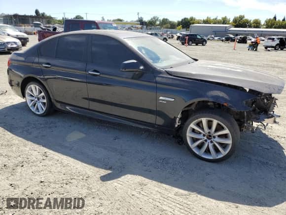 2011 BMW 5 Series 550i xDrive with VIN WBAFU9C52BC786442, listed as a Copart auction lot 66315315 with Not provided miles and Salvage title. Bid and sale history available at DreamBid. Image 4.