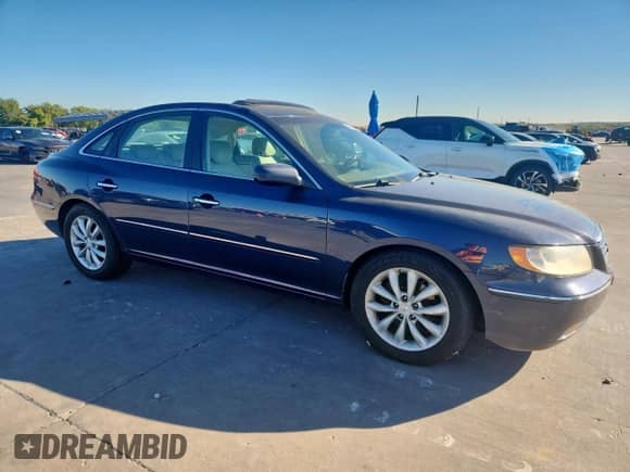 2006 Hyundai Azera SE с VIN KMHFC46F36A113380, выставлен на аукционе Copart как лот 90662845 с пробегом 106 432 миль миль и Чистый • Clean title. История ставок и продаж доступна на DreamBid. Изображение 4.