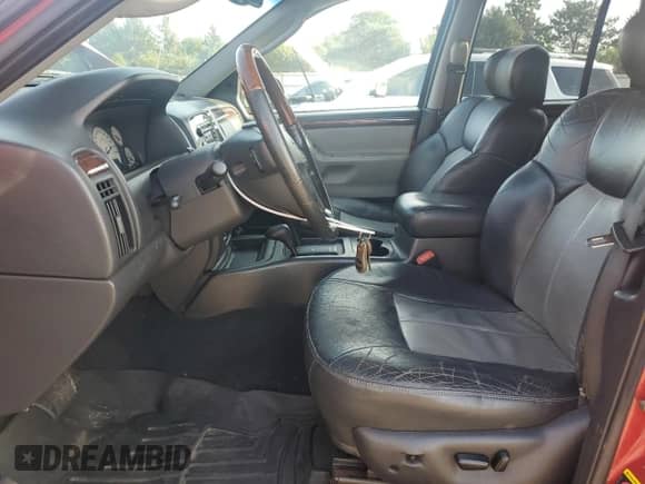 2004 Jeep Grand Cherokee Overland с VIN 1J8GW68J14C371632, выставлен на аукционе Copart как лот 63509385 с пробегом 114 501 миль миль и Списание • Salvage title. История ставок и продаж доступна на DreamBid. Изображение 7.