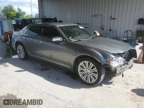 2012 Chrysler 300 Limited with VIN 2C3CCACG1CH188874, listed as a Copart auction lot 81132075 with 160,329 mi miles and Salvage title. Bid and sale history available at DreamBid. Image 4.