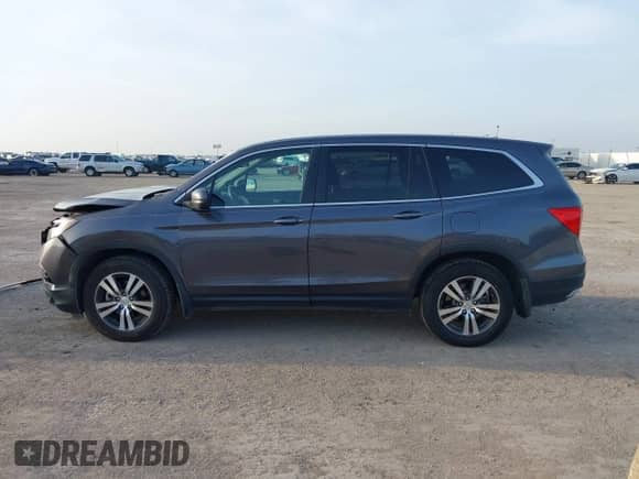 2017 Honda Pilot EX-L with VIN 5FNYF5H86HB020761, listed as a IAAI auction lot 42764250 with 66,033 mi miles and . Bid and sale history available at DreamBid. Image 14.