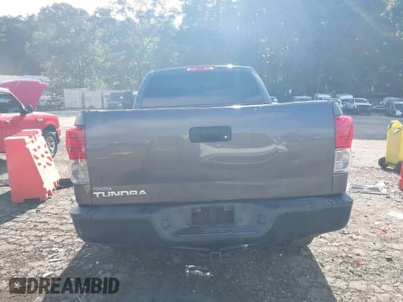 2012 Toyota Tundra z VIN 5TFRU5F14CX026640, wystawiony jako IAAI lot #42994627 z przebiegiem 310 619 mil mil oraz . Historia ofert i sprzedaży dostępna na DreamBid. Obrazek 16.