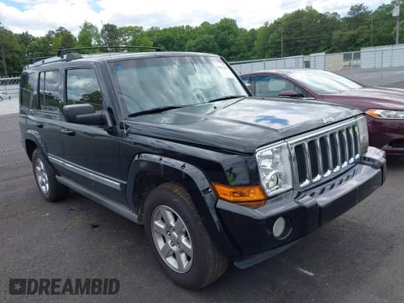 2006 Jeep Commander Limited z VIN 1J8HH58N16C309677, wystawiony jako IAAI lot #42181393 z przebiegiem 310 457 mil mil oraz . Historia ofert i sprzedaży dostępna na DreamBid. Obrazek 1.