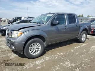 2016 Nissan Frontier S with VIN 1N6AD0ER2GN739722, listed as a Copart auction lot 80560635 with 64,182 mi miles and Salvage title. Bid and sale history available at DreamBid. Image 1.