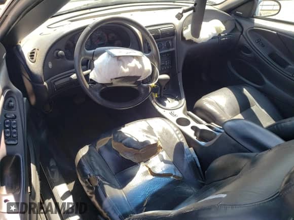 2002 Ford Mustang GT Deluxe z VIN 1FAFP45X92F214932, wystawiony jako Copart lot #68689875 z przebiegiem Nie podano mil oraz Szkoda całkowita • Salvage title. Historia ofert i sprzedaży dostępna na DreamBid. Obrazek 8.