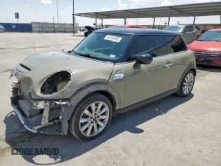 2020 MINI Hardtop Cooper S with VIN WMWXR5C09L2M63693, listed as a Copart auction lot 60236265 with 51,518 mi miles and Salvage title. Bid and sale history available at DreamBid. Image 1.