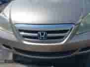 2005 Honda Odyssey EX z VIN 5FNRL38465B409863, wystawiony jako IAAI lot #43009481 z przebiegiem 255 902 mil mil oraz . Historia ofert i sprzedaży dostępna na DreamBid. Obrazek 6.