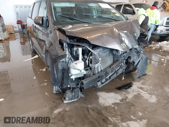 2012 Toyota Sienna with VIN 5TDKA3DC0CS012095, listed as a IAAI auction lot 41317071 with Not provided miles and . Bid and sale history available at DreamBid. Image 12.