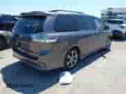 2012 Toyota Sienna SE with VIN 5TDXK3DC5CS232979, listed as a IAAI auction lot 43136504 with 198,231 mi miles and . Bid and sale history available at DreamBid. Image 4.