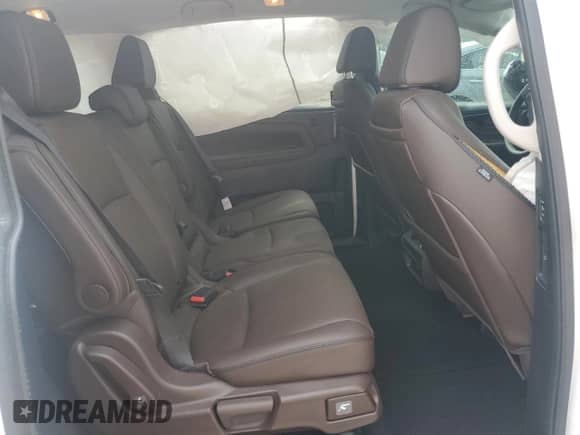 2025 Honda Odyssey Touring z VIN 5FNRL6H88SB054596, wystawiony jako Copart lot #81192585 z przebiegiem Nie podano mil oraz Szkoda całkowita • Salvage title. Historia ofert i sprzedaży dostępna na DreamBid. Obrazek 10.