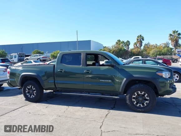 2021 Toyota Tacoma SR5 z VIN 3TMDZ5BN8MM114649, wystawiony jako IAAI lot #43493615 z przebiegiem 63 288 mil mil oraz . Historia ofert i sprzedaży dostępna na DreamBid. Obrazek 14.