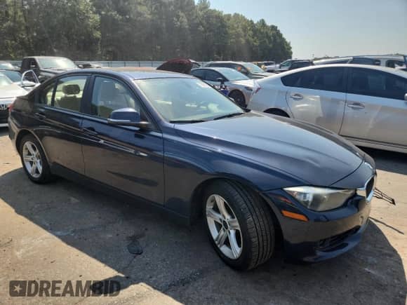 2014 BMW 3 Series 328i xDrive with VIN WBA3B3C51EJ981034, listed as a Copart auction lot 71869695 with 160,025 mi miles and Salvage title. Bid and sale history available at DreamBid. Image 4.