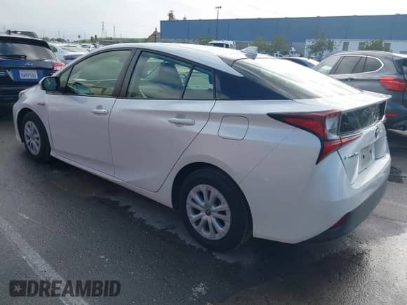 2019 Toyota Prius L Eco with VIN JTDKARFU7K3093038, listed as a IAAI auction lot 41768066 with 124,495 mi miles and . Bid and sale history available at DreamBid. Image 3.