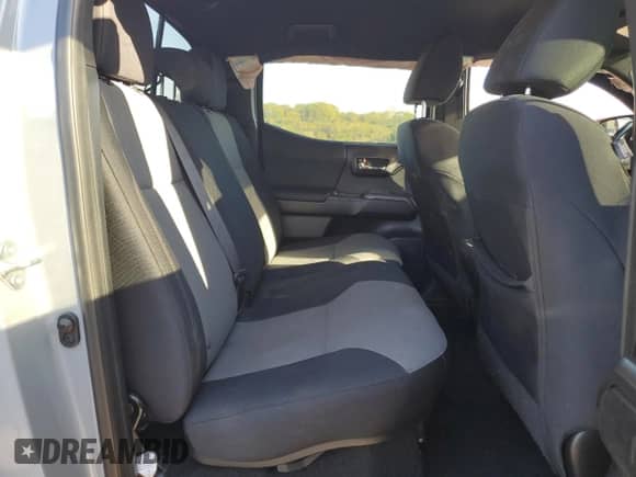 2021 Toyota Tacoma SR with VIN 3TMCZ5AN1MM425739, listed as a Copart auction lot 84917565 with 77,559 mi miles and Clean title. Bid and sale history available at DreamBid. Image 10.