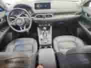 2023 Mazda CX-5 S Carbon Edition z VIN JM3KFBCM6P0194780, wystawiony jako Copart lot #70113105 z przebiegiem 50 849 mil mil oraz Szkoda całkowita • Salvage title. Historia ofert i sprzedaży dostępna na DreamBid. Obrazek 8.