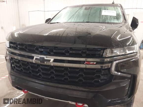 2021 Chevrolet Suburban Z71 z VIN 1GNSKDKD7MR355119, wystawiony jako IAAI lot #41310941 z przebiegiem 146 399 mil mil oraz . Historia ofert i sprzedaży dostępna na DreamBid. Obrazek 12.