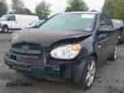 2007 Hyundai Accent SE z VIN KMHCN36C57U032765, wystawiony jako IAAI lot #43286052 z przebiegiem 70 080 mil mil oraz . Historia ofert i sprzedaży dostępna na DreamBid. Obrazek 2.