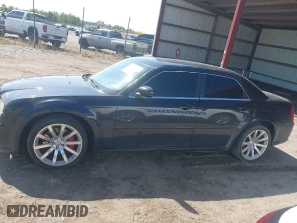 2006 Chrysler 300 C SRT-8 с VIN 2C3KA73W56H332748, выставлен на аукционе IAAI как лот 43292460 с пробегом 168 014 миль миль и . История ставок и продаж доступна на DreamBid. Изображение 14.