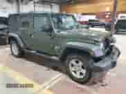 2008 Jeep Wrangler Unlimited X with VIN 1J4GA39158L583789, listed as a Copart auction lot 86292065 with 170,334 mi miles and Salvage title. Bid and sale history available at DreamBid. Image 4.