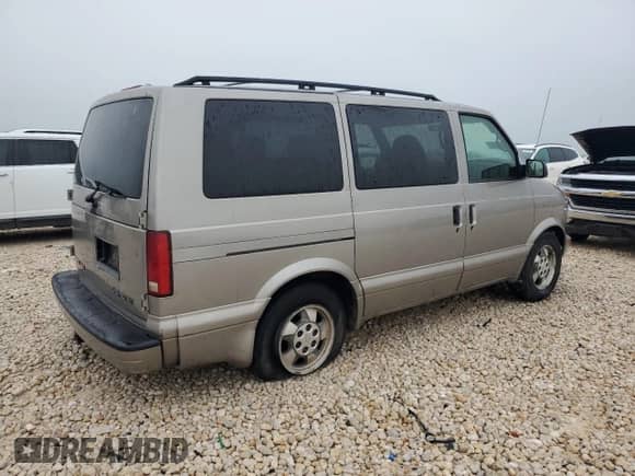 2003 Chevrolet Astro z VIN 1GNEL19X33B102489, wystawiony jako Copart lot #55686585 z przebiegiem 200 050 mil mil oraz Szkoda całkowita • Salvage title. Historia ofert i sprzedaży dostępna na DreamBid. Obrazek 3.