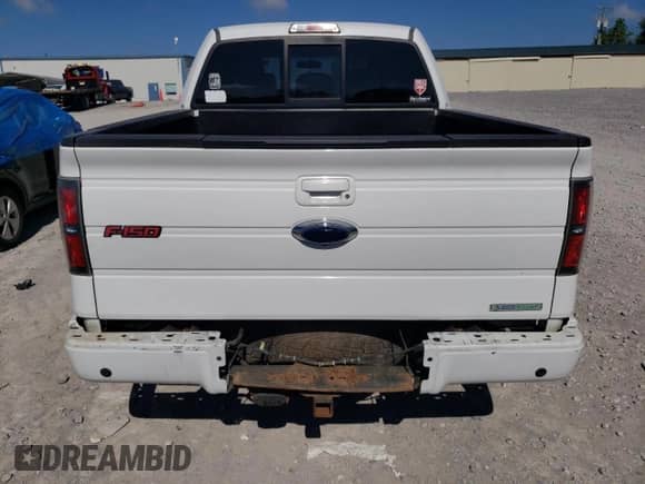 2012 Ford F-150 Lariat with VIN 1FTFW1ET4CFB12867, listed as a Copart auction lot 84019765 with 163,215 mi miles and Clean title. Bid and sale history available at DreamBid. Image 6.