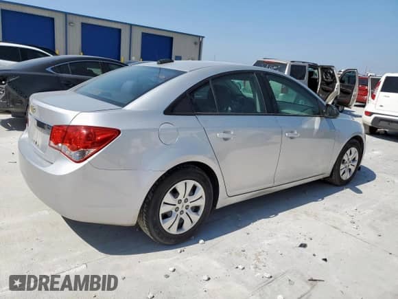 2015 Chevrolet Cruze LS z VIN 1G1PA5SH6F7155429, wystawiony jako Copart lot #65501925 z przebiegiem 139 301 mil mil oraz Czysty tytuł • Clean title. Historia ofert i sprzedaży dostępna na DreamBid. Obrazek 3.