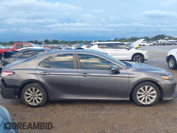 2020 Toyota Camry LE with VIN 4T1C11AK8LU400249, listed as a IAAI auction lot 43265675 with 226,398 mi miles and . Bid and sale history available at DreamBid. Image 13.