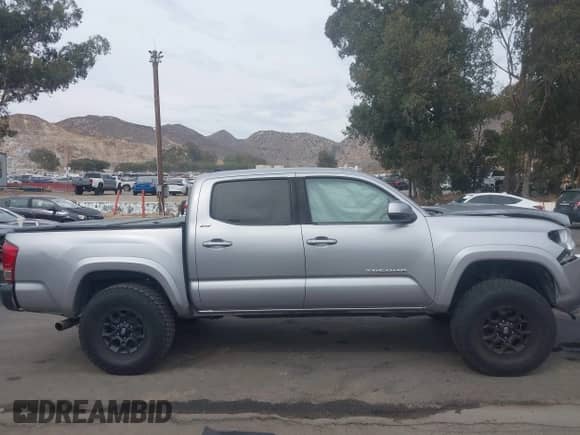 2019 Toyota Tacoma SR5 with VIN 3TMAZ5CN9KM108003, listed as a IAAI auction lot 43249340 with 80,485 mi miles and . Bid and sale history available at DreamBid. Image 14.